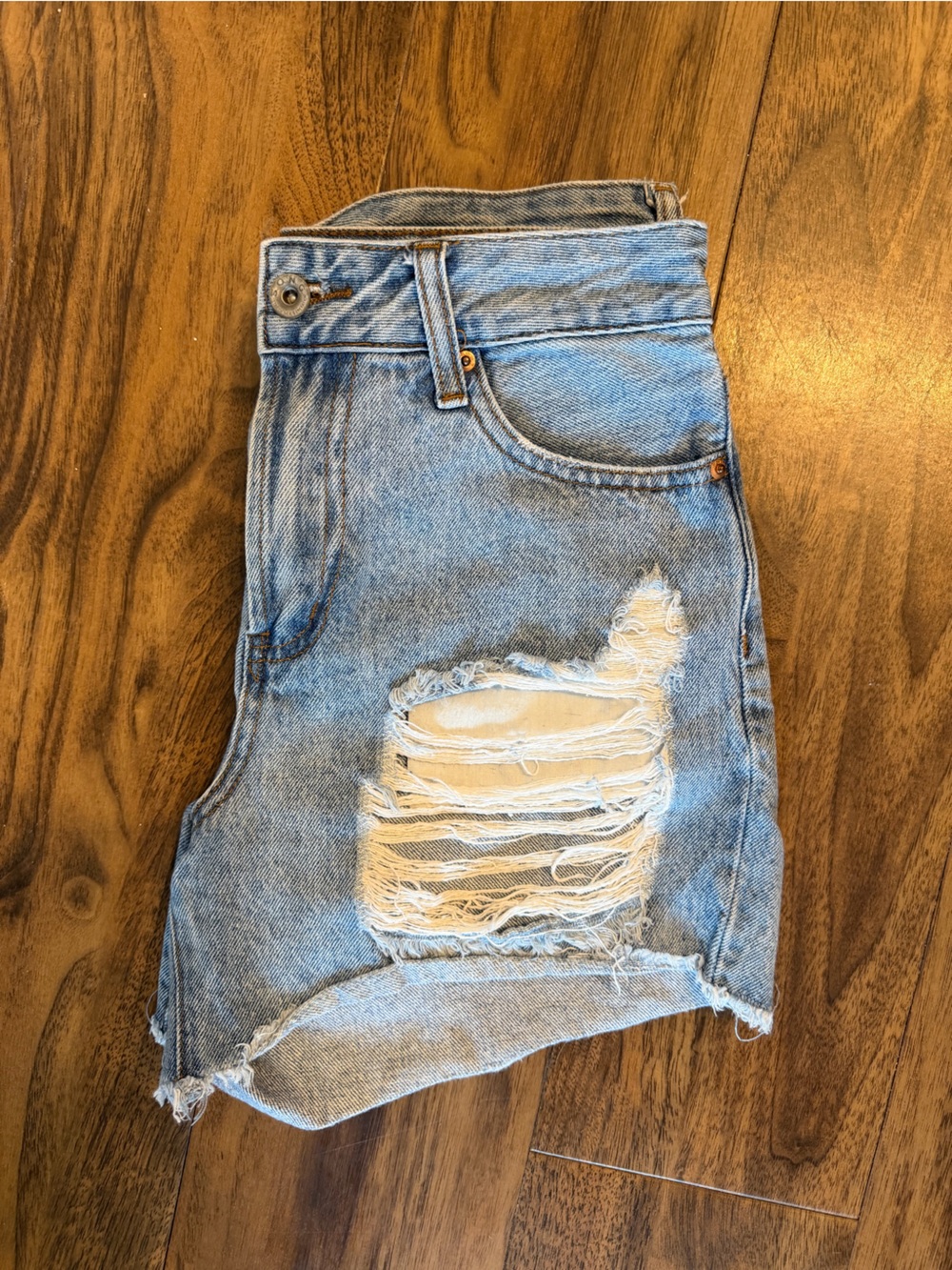 Women’s Light Blue Distressed Denim Shorts with Frayed Hem